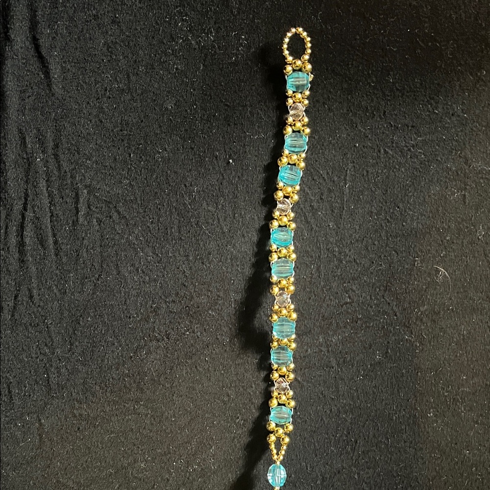 Elegant Gold and Blue Bracelet